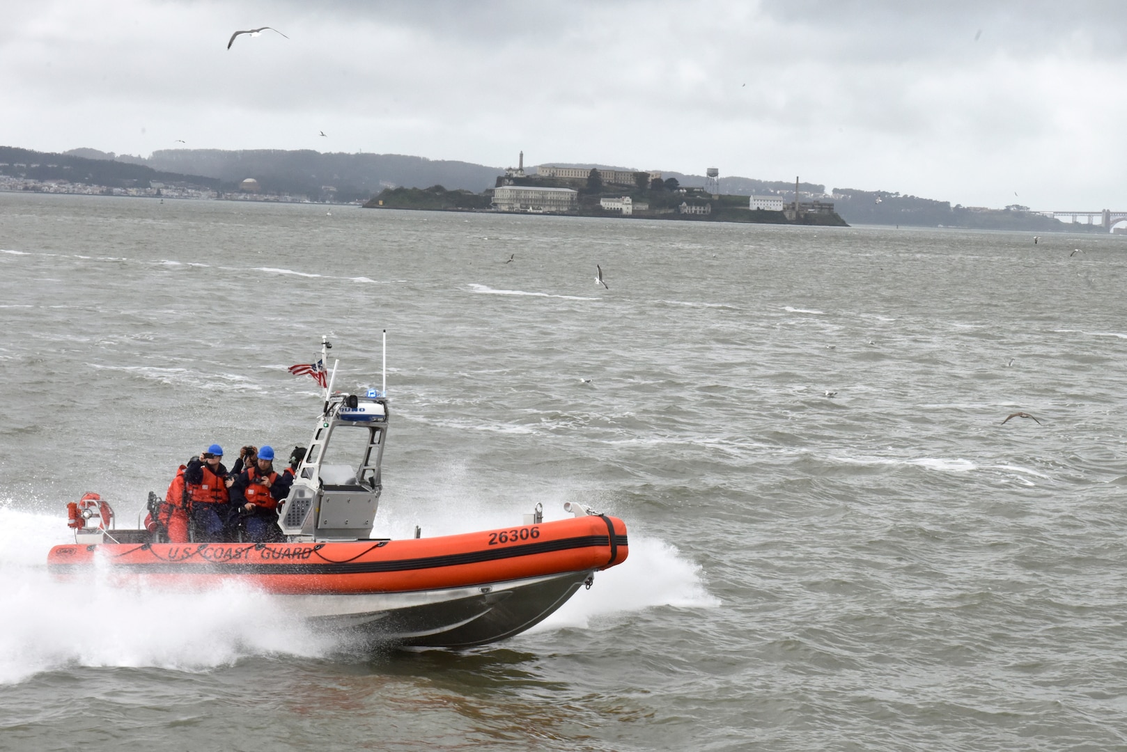 Crewmembers stationed aboard the Coast Guard Cutter Robert Ward, a Sentinel Class Fast Response Cutter, demonstrate the maneuverability of their 26-foot Over the Horizon IV Cutter Boat in San Francisco Bay, Feb. 28, 2019. The Robert Ward is the newest Coast Guard cutter to be stationed in California and will provide additional resources to the Coast Guard in emergency response, maritime smuggling, marine safety, environmental protection, search and rescue, and port security.