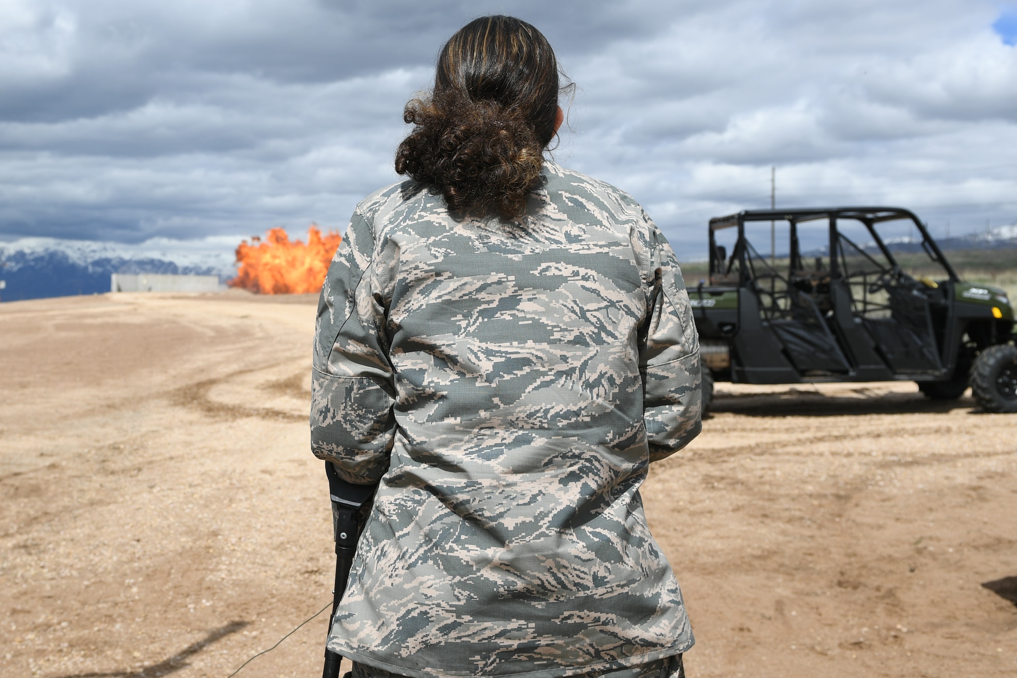 Michelle McConnell detonates controlled ordnance with the help of airmen from 775th Explosive Ordinance Disposal Flight April 22, 2019, at Hill Air Force Base, Utah. Michelle was granted her wish to be Airman of the day by Make-A-Wish Utah and 75th Air Base Wing at Hill. (U.S. Air Force Photo by Cynthia Griggs)