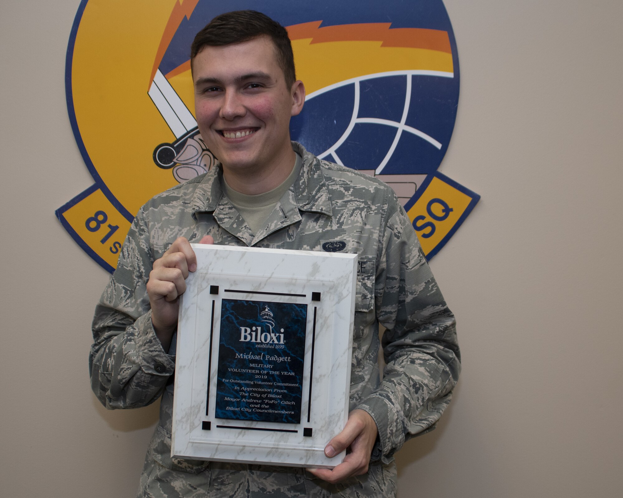 U.S. Air Force Senior Airman Michael Padgett, 81st Communications Squadron client systems technician, poses for a picture inside the Locker House on Keesler Air Force Base, Mississippi, April 25, 2019. Padgett received the 2019 Military Volunteer of the Year award for the City of Biloxi, for his selfless dedication to volunteering in the local community. (U.S. Air Force photo by Airman 1st Class Spencer Tobler)