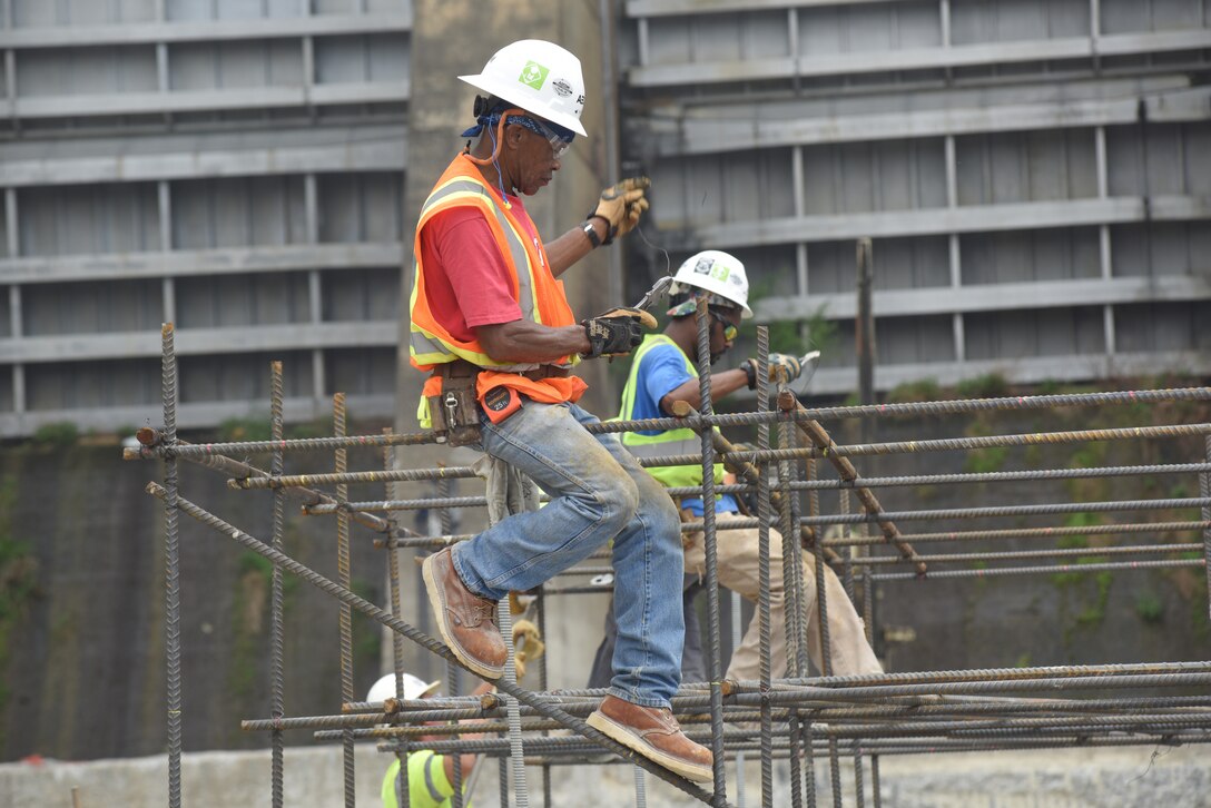 Construction workers with AECOM work in the coffer dam to prepare the foundation April 25, 2019 for concrete placement as part of the Chickamauga Lock Replacement Project Lock Chamber Contract, which is managed by the U.S. Army Corps of Engineers Nashville District.  The Tennessee Valley Authority project is located on the Tennessee River in Chattanooga, Tenn. (USACE photo by Lee Roberts)