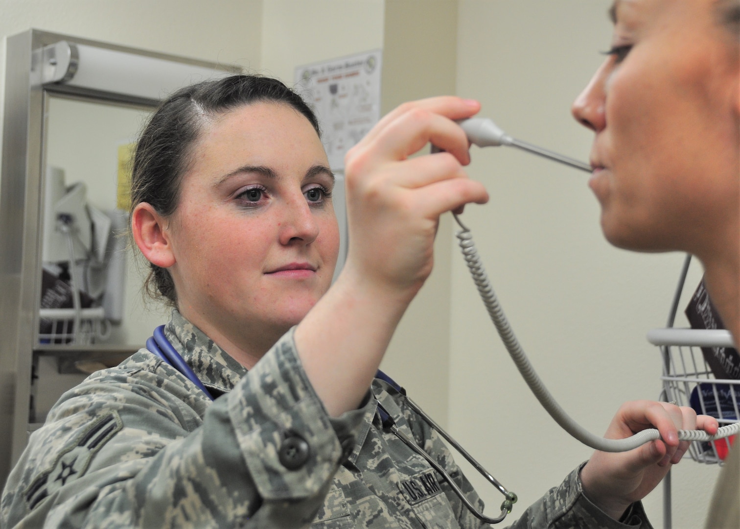 Airman First Class Lexie Gilotti, 359th Medical Group Family Health medical technician checks the temperature of a simulated patient, April 23, 2019, Joint Base San Antonio-Randolph, Texas. National Nurses Week begins each year on May 6th and ends on May 12th, Florence Nightingale's birthday.