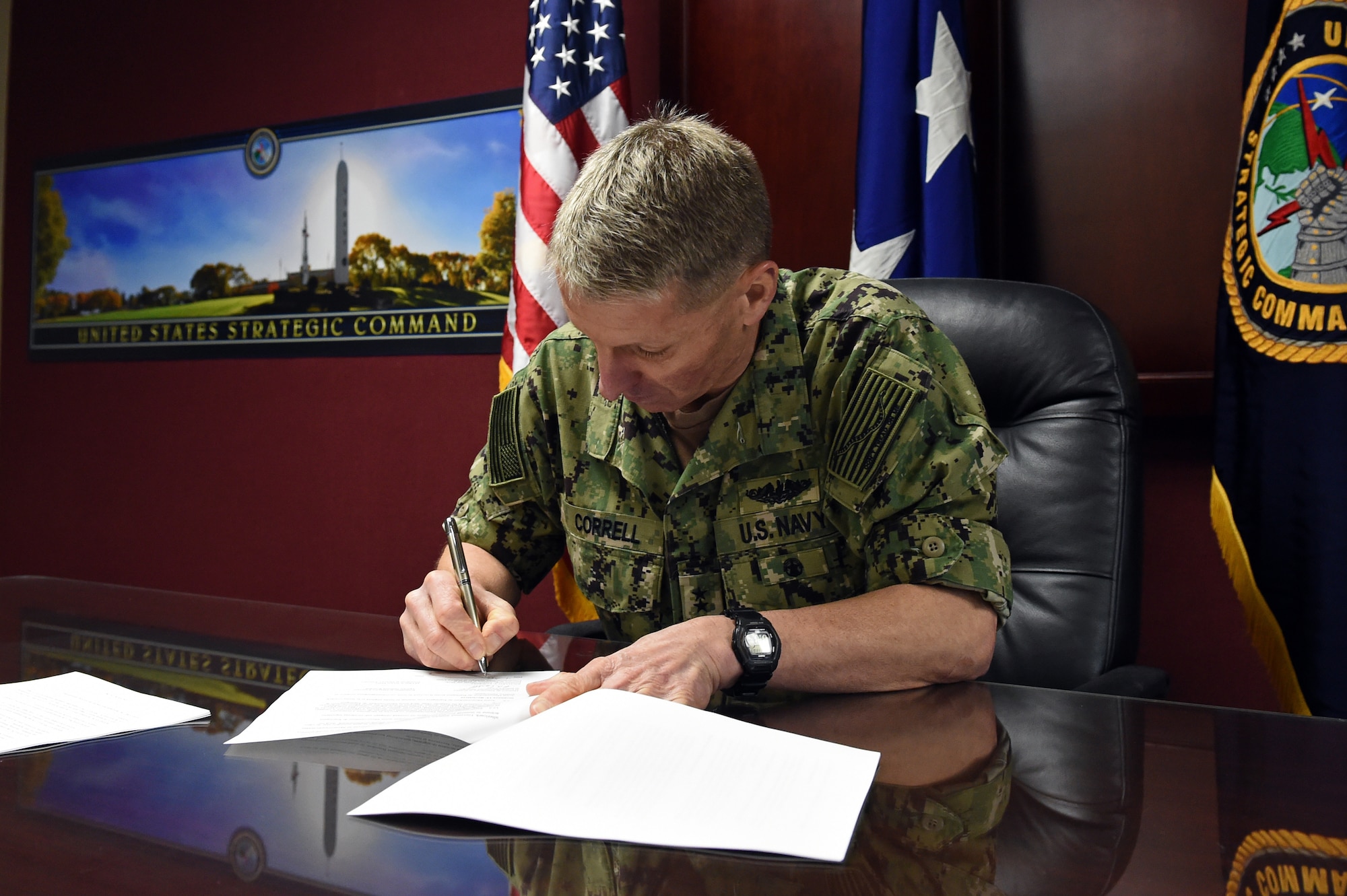 Rear Adm. Richard Correll, U.S. Strategic Command director of plans and policy, signs the United States-Romania Space Situational Awareness (SSA) agreement at USSTRATCOM Headquarters at Offutt Air Force Base, Neb., on April 4, 2019. SSA data-sharing agreements enhance multinational space cooperation and streamline the process for USSTRATCOM partners to request specific information gathered by USSTRATCOM’s Joint Space Operations Center at Vandenberg Air Force Base, Calif. The information is crucial for launch support, satellite maneuver planning, support for on-orbit anomalies, electromagnetic interference reporting and investigation, satellite decommissioning activities and on-orbit conjunction assessments.