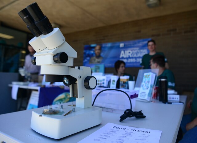 The 9th Civil Engineer Squadron environmental office sets up an outreach table during Earth Week 2019