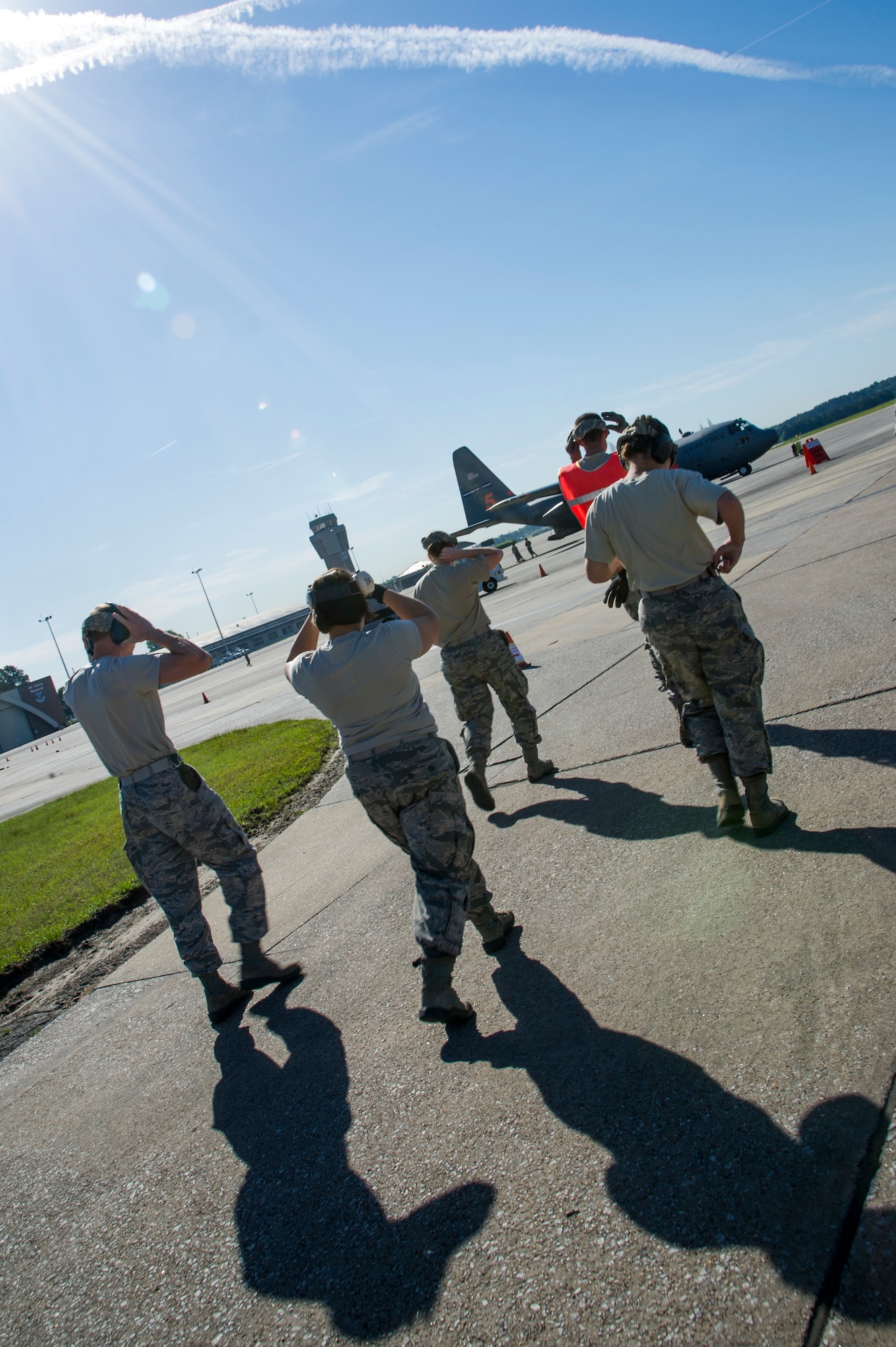 Members from the 39th Aerial Port Squadron, an Air Force Reserve unit in the 302nd Airlift Wing, Peterson Air Force Base, Colorado, compete in an engine-running onload/offload competition during Air Force Reserve Command’s Port Dawg Challenge at Dobbins Air Reserve Base, Georgia, April 23, 2019.