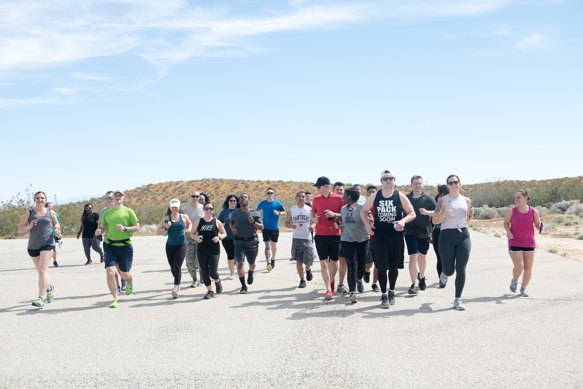 Members of the Edwards Air Force Base, California, community participate in a Sexual Assault Awareness and Prevention Month 5k Run, April 19. (U.S. Air Force photo by Joe J. Jones)