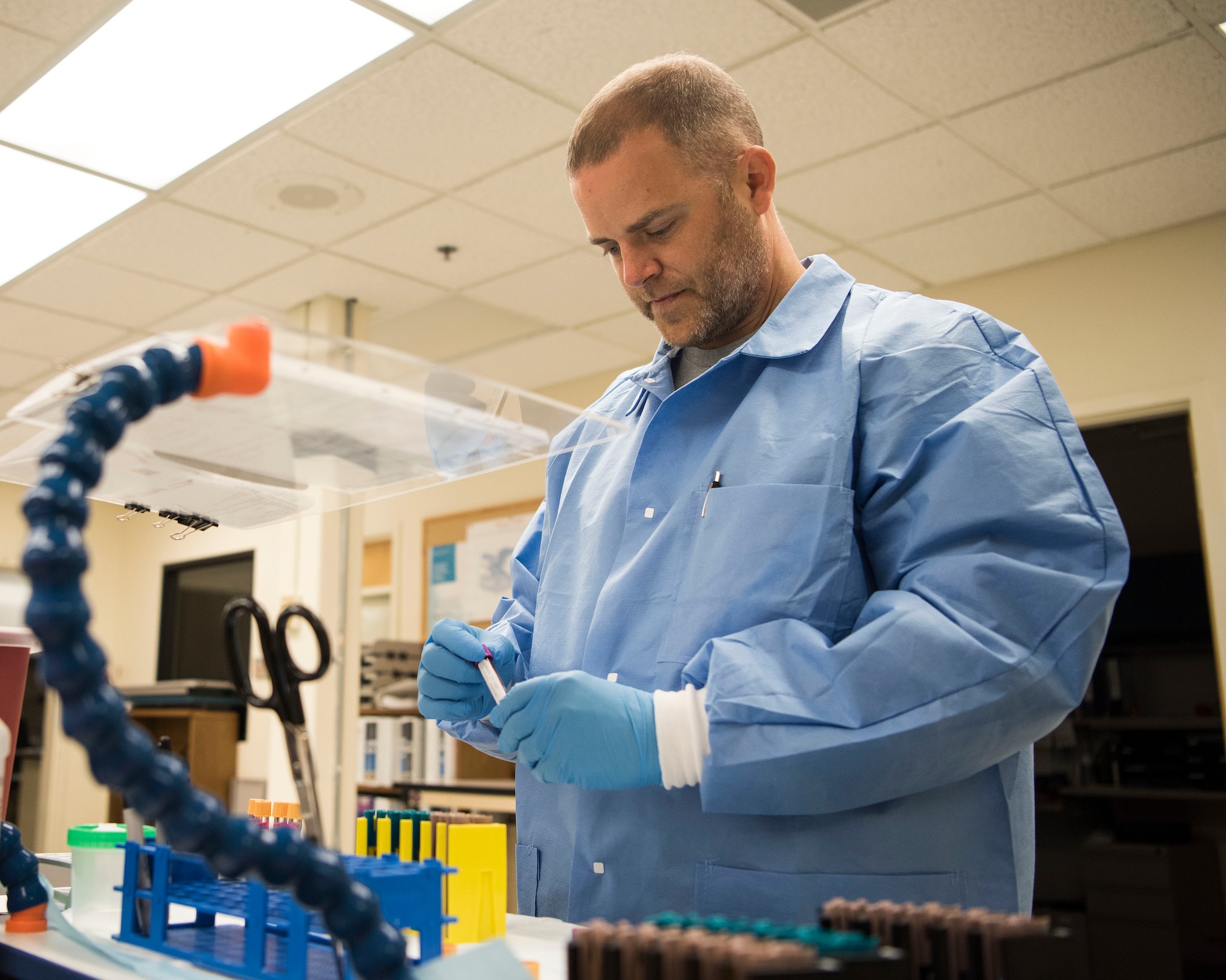 Jeremy Johnson, 30th Medical Support Squadron medical technologist, fills a vial of blood at Vandenberg Air Force Base, California, April 24, 2019. Members working in the 30th MDSS Laboratory perform critical testing in chemistry, hematology, and urinalysis, aiding in various diagnoses, such as urinary tract infections, high cholesterol, diabetes and more serious diseases that directly coincide to the 30th Space Wing’s Individual Medical Readiness, flight physicals, and occupational health readiness. (U.S. Air Force photo by Airman 1st Class Hanah Abercrombie)