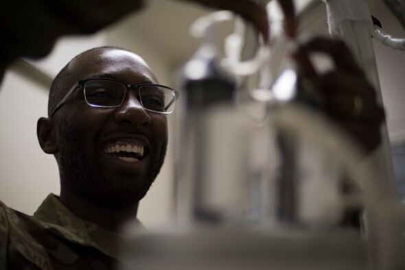 U.S. Air Force Senior Airman William Gathers, a 35th Surgical Operation Squadron radiology technician, prepares for a contrast enhance computed tomography examination at Misawa Air Base, Japan, April 10, 2019. With less than 100 ultrasound techs in the U.S. Air Force and less than half of those nationally registered the start of the Continuous Process Improvement Pacific Ultrasound Peer Review program, which allows U.S. Pacific Air Force technicians to select previously performed ultrasounds at random and inspect them for accuracy, give radiology Airmen an opportunity to train and learn from their counterparts and peers. (U.S. Air Force photo by Senior Airman Collette Brooks)