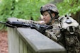 U.S. Army Reserve Spc. Yannik Marazia, a heavy wheeled vehicle operator with the 510th Regional Support Group, 7th Mission Support Command (MSC), Kaiserslautern, Germany, wades through a trench while maneuvering the obstacle course during the 7th MSC Best Warrior Competition (BWC) in Kaiserslautern, Germany, April 26, 2019. BWC is an annual event designed to test the physical fitness, military knowledge, marksmanship, endurance and land navigational skills of each competitor. (U.S. Army Reserve photo by Sgt Christopher Stelter, 221st Public Affairs Detachment)