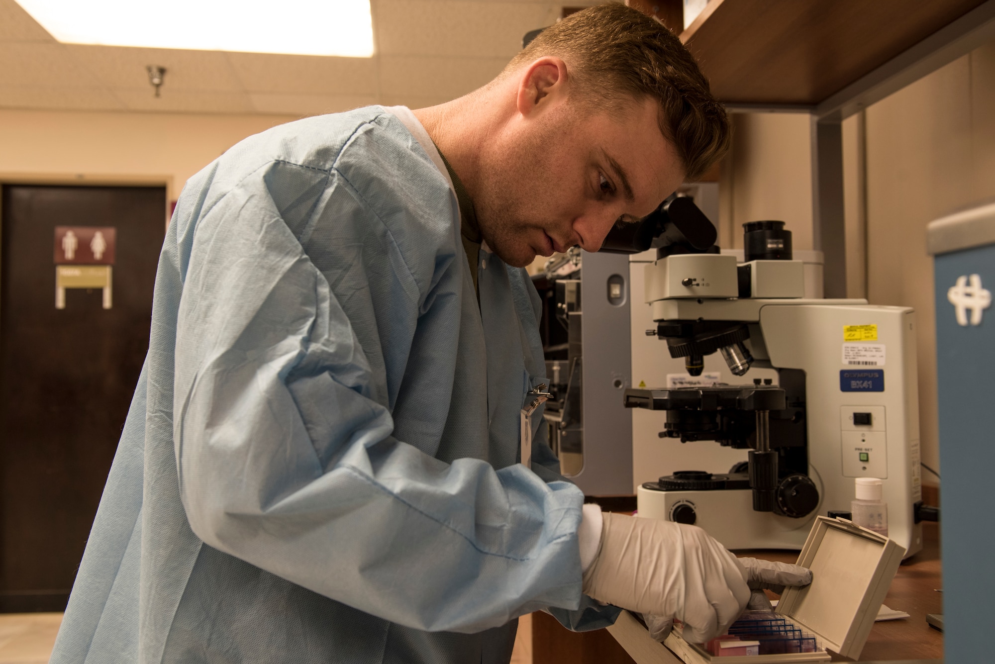 Staff Sgt. Jake Henry, 39th Medial Support Squadron laboratory technician, analyzes a sample March 28, 2019, at Incirlik Air Base, Turkey. Lab technicians test blood samples, as well as assit primary care managers in treating patients based on their analysis. (U.S. Air Force photo by Staff Sgt. Matthew J. Wisher)