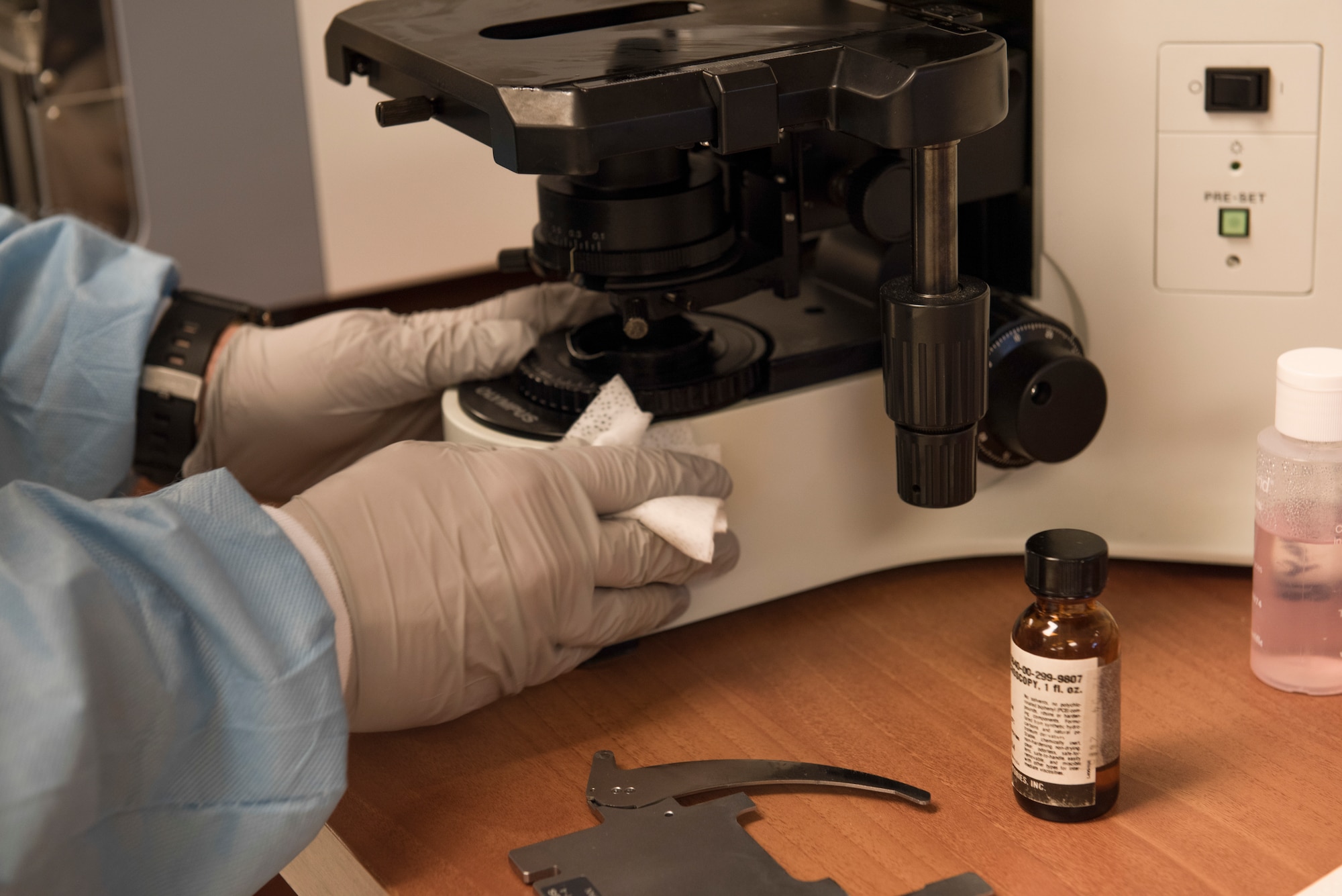 Staff Sgt. Jake Henry, 39th Medical Support Squadron laboratory technician, cleans the microscope after analyzing a sample March 28, 2019, at Incirlik Air Base, Turkey. Lab technicians are trained analyst that help determine patients with their ailments. (U.S. Air Force photo by Staff Sgt. Matthew J. Wisher)