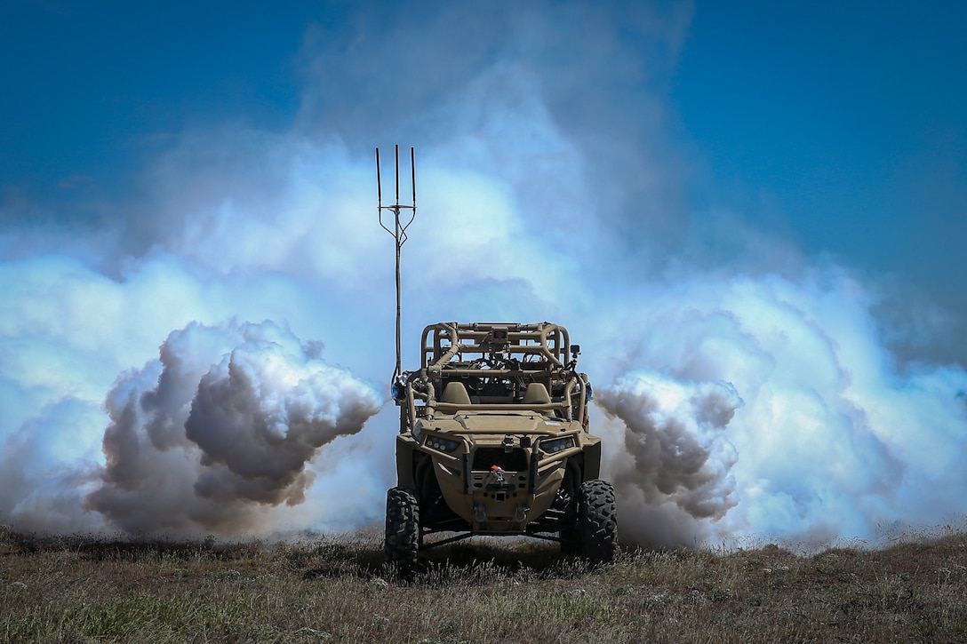 A Screening Obscuration Module attached to a Utility Task Vehicle is autonomously activated during the Robotic Complex Breach Concept on Yakima Training Center in Yakima, Washington, April 26, 2019. RCBC allows the military to utilize autonomous systems that provide increased awareness on the modernization of the equipment.
