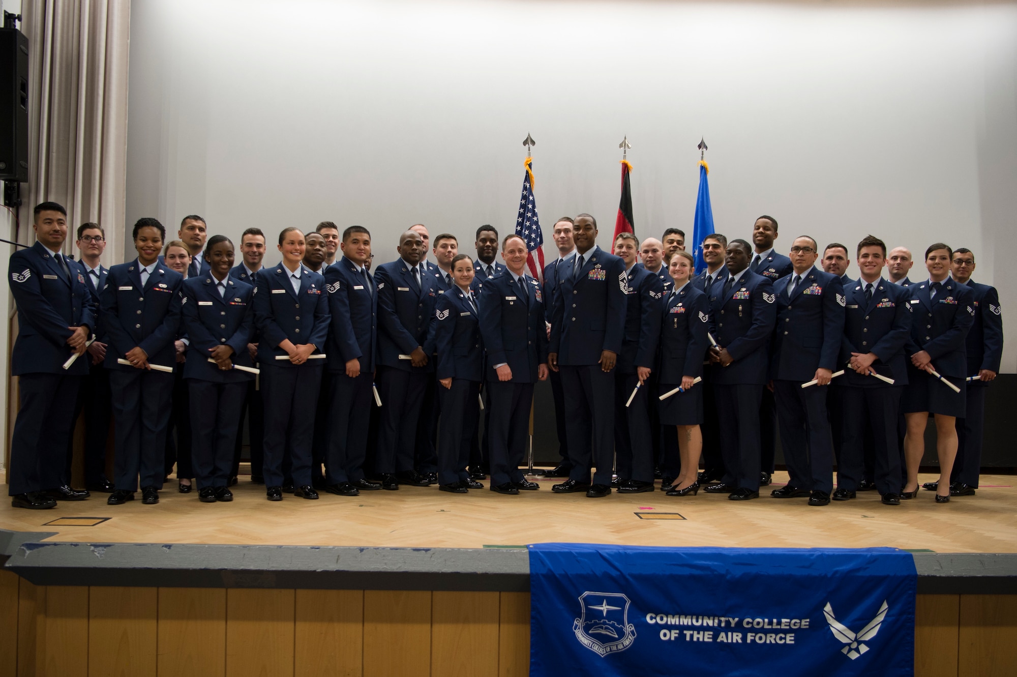 The Airmen earned their associates degrees in various career-related fields as part of their completion from the largest community college in the United States.