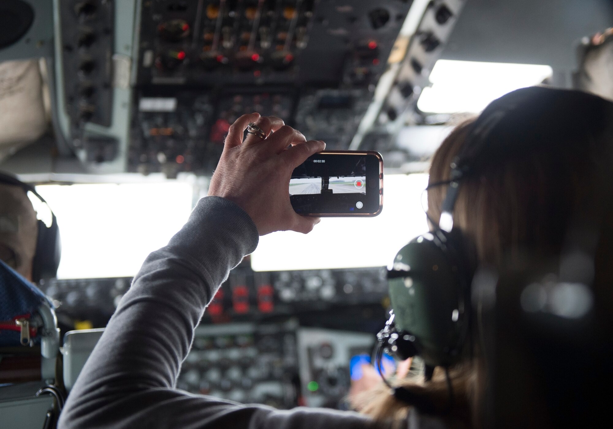 An employer takes a video during a landing in one of Grissom’s KC-135R Stratotankers during an employer incentive flight. Employers throughout the state of Indiana got a glimpse at what Airmen do while they are away from their civilian lives. (U.S. Air Force photo/Tech. Sgt. Jami K. Lancette)