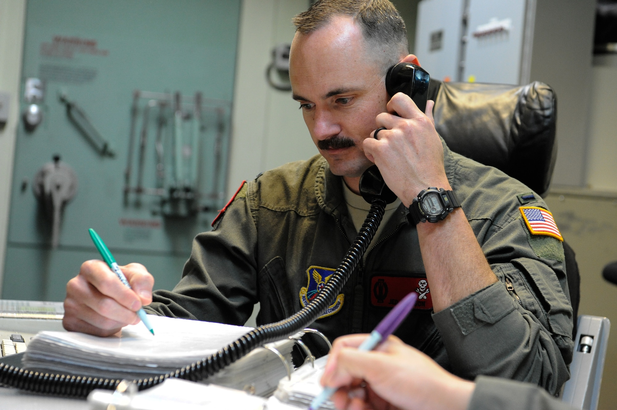 1st Lt. Jedediah Simpson, 320th Missile Squadron missileer, coordinates post maintenance actions during training on F.E. Warren Air Force Base, Wyoming, April 25, 2019. The Air Force Association awarded Simpson, and 1st Lt. Austin Van Hoesen, 320 MS assistant flight commander, the 2019 Gen. Thomas S. Power Outstanding Missile Crew Award. (U.S. Air Force photo by Joseph Coslett)