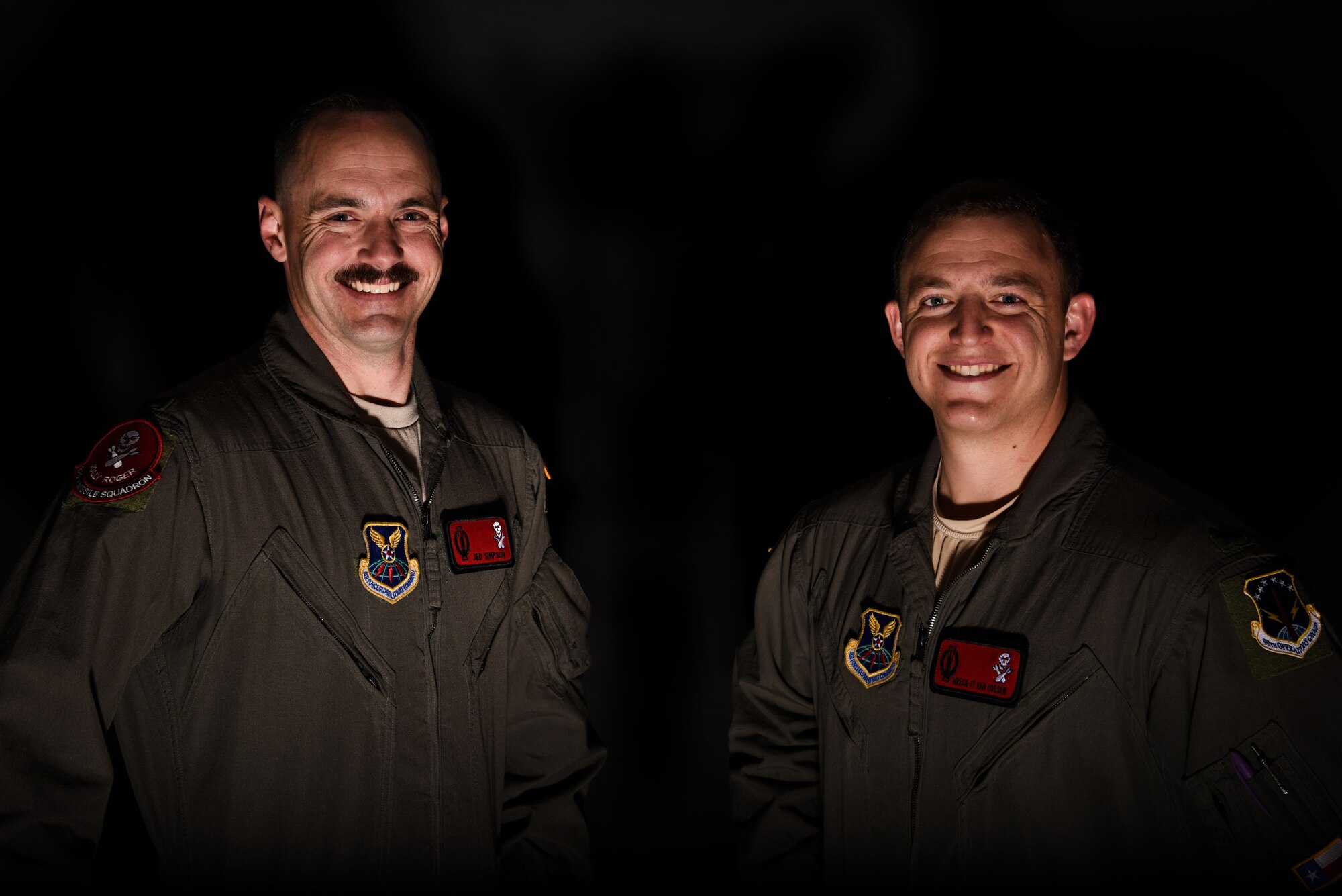 1st Lt. Jedediah Simpson, 320 Missile Squadron missilieer, and 1st Lt. Austin Van Hoesen, 320 MS assitant flight commander, pose for photos on F.E. Warren Air Force Base, Wyoming, April 25, 2019. The Air Force Association awarded Van Hoesen and Simpson, 320 MS missiler, the 2019 Gen. Thomas S. Power Outstanding Missile Crew Award. (U.S. Air Force photo by Joseph Coslett)