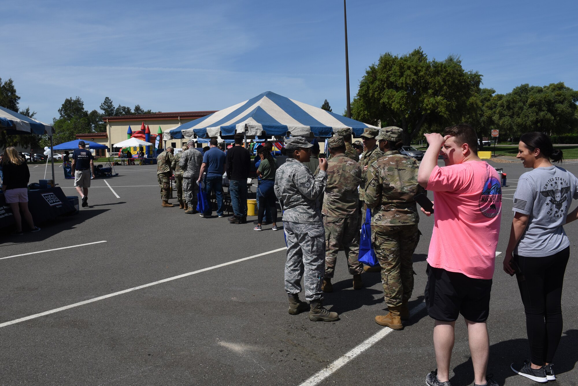 Airmen from the 60th Air Mobility Wing attend the Sexual Assault Prevention and Response Block Party April 26, 2019, at Travis Air Force Base, California. The Air Force Sexual Assault Prevention and Response Office’s mission is to educate, advocate and collaborate to respond to and stop sexual assault and its harmful effects on the Air Force. (U.S. Air Force photo by Airman 1st Class Cameron Otte)