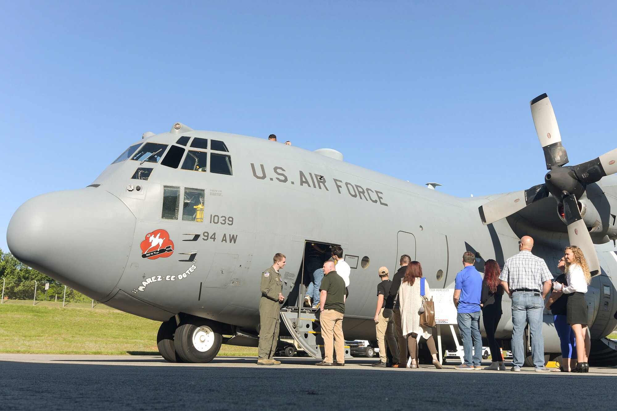 Students and their parents tour a C-130 Hercules aircraft at Dobbins Air Reserve Base, Ga. on April 27, 2019. Students visited Dobbins while attending Academy Day, an annual event where United States service academies and congressional representatives visit so that students can learn about the academies and obtain congressional recommendations (U.S. Air Force photo by Tech. Sgt.  Miles Wilson)