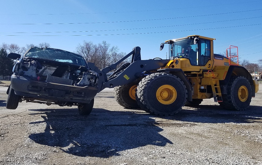 Material Examiner and Identifier Jared Vierheller maneuvers a scrap-pile Ford F-350 during advanced material handling equipment training held in Columbus, Ohio, in April. Vierheller is one of five Columbus-based agency employees currently earning on-the-job credit hours toward certification.