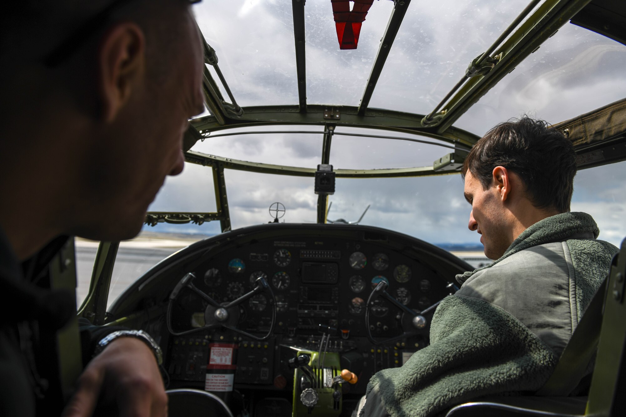 A B-25 Mitchell is open for base members to view as the aircraft was put on static display by the Pride Hangar at Ellsworth Air Force Base, S.D., April 18, 2019, as part of an event commemorating the 77th anniversary of the Doolittle Raid.  The B-25 took part in a U.S. retaliatory mission against Japan April 19, 1942, following the attack on Pearl Harbor, Honolulu, in 1941. (U.S. Air Force photo by Airman 1st Class Thomas Karol)