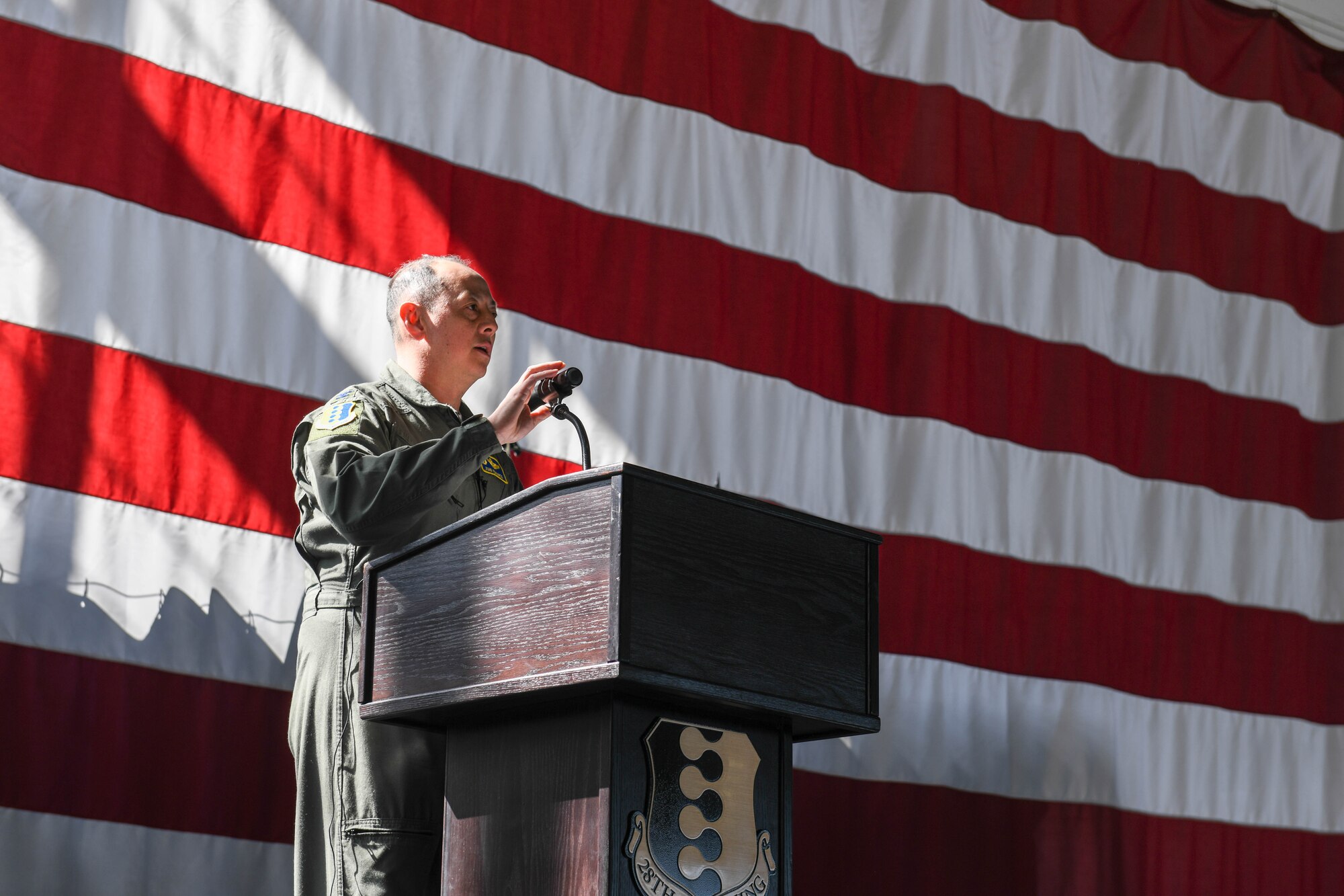 Col. John Edwards, the 28th Bomb Wing commander, gives opening remarks at the start of the 77th Anniversary of the Doolittle Raid heritage event at Ellsworth Air Force Base, S.D., April 18, 2019. Three of the squadrons that participated in the Doolittle Raid are based out of Ellsworth AFB, making it an ideal location for the anniversary of the Raid. (U.S. Air Force photo by Airman 1st Class Thomas Karol)