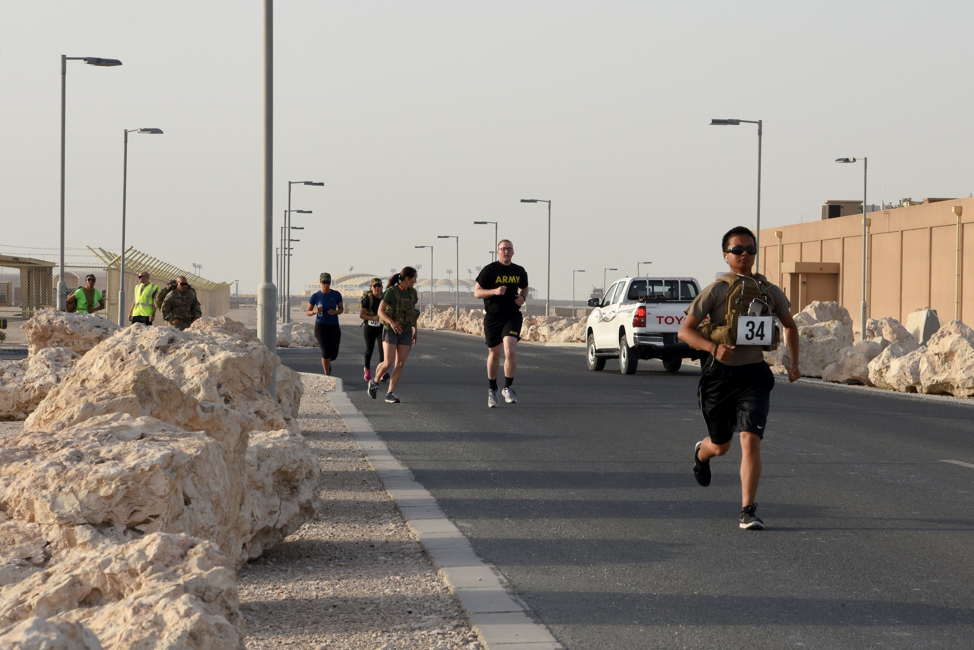 A group of military members ruck for sexual assault and prevention month on April 26, 2019 at Al Udeid Air Base, Qatar. Sexual Assault is an issue that impacts almost every member in the military in some way, shape, or form. There were approximately 6,700 reported case of sexual assault last year and the ruck was symbolic to recognize each survivor. (U.S. Air Force photo by Staff Sgt. Ashley L. Gardner)