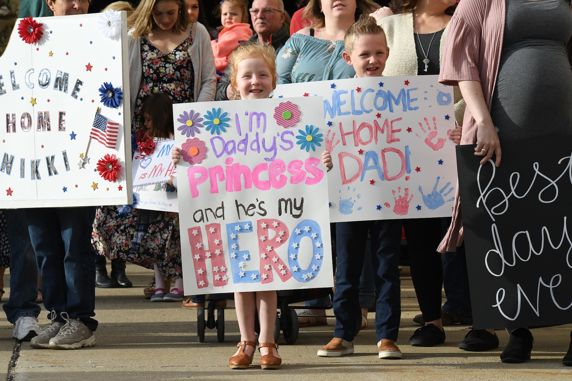 Friends and family await the return of Airmen assigned to the 729th Air Control Squadron at Hill Air Force Base, Utah, April 29, 2019, following the unit's 7-month Middle East deployment. While deployed, 729th ACS Airmen provided aircraft control and air surveillance across a 1.1 million square miles of U.S. Air Force Central Command airspace. (U.S. Air Force photo by R. Nial Bradshaw)