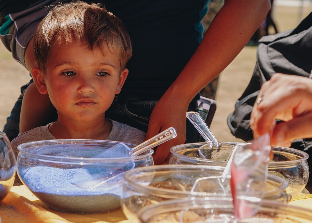 Volunteers create arts and crafts during a volunteer of the year event at Victory Field, Marine Corps Air Ground Combat Center, Twentynine Palms, Calif., April 24, 2019. The American Friends of our Armed Forces (AFAF) sponsored the award ceremony to show appreciation for AFAF volunteers and staff. (U.S. Marine Corps photo by Lance Cpl. Robin Lewis)