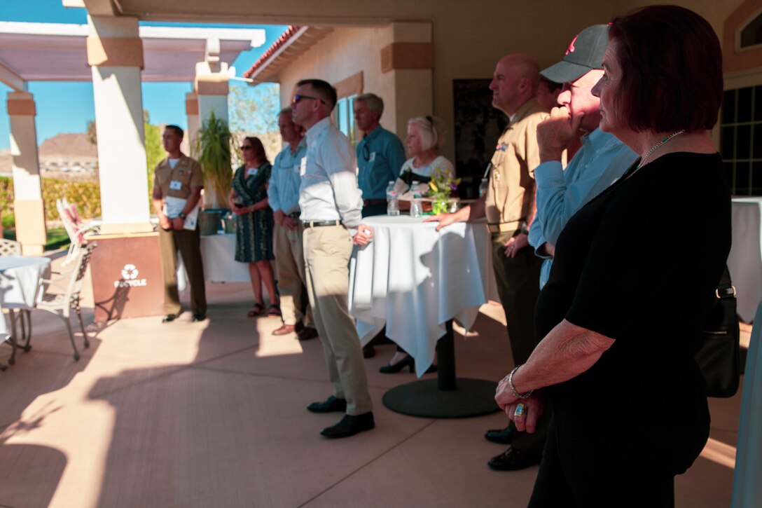 Guests listen to comments from U.S. Marine Corps Brig. Gen. Roger Turner, commanding general, Marine Air Ground Task Force Training Command (MAGTFTC), Marine Corps Air Ground Combat Center (MCAGCC), Twentynine Palms, Calif., during an Earth Day celebration at he and his wife, Carol Turner’s home, April 24, 2019. The event was part of MCAGCC’s annual observance of Earth Day which includes multiple events aimed at fostering awareness of environmental conservation on and around the Marine Corp’s largest training installation. (U.S. Marine Corps photo by Cpl. Dallas Johnson)