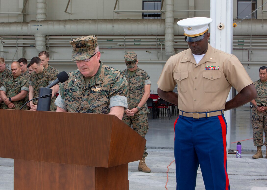 U. S. Navy Cmdr. Bruce Vaughan, a chaplain for Marine Aircraft Group 39, 3rd Marine Aircraft Wing, delivers the invocation during the Marine Medium Tiltrotor Squadron (VMM) 164 relief and appointment ceremony at Marine Corps Air Station Camp Pendleton, Calif., April 25, 2019. During the ceremony Sgt. Maj. David White relinquished his post as the VMM-164 sergeant major to Sgt. Maj. Jeffery Vandentop. (U.S. Marine Corps photo by Sgt. Charnelle Smith/Released)