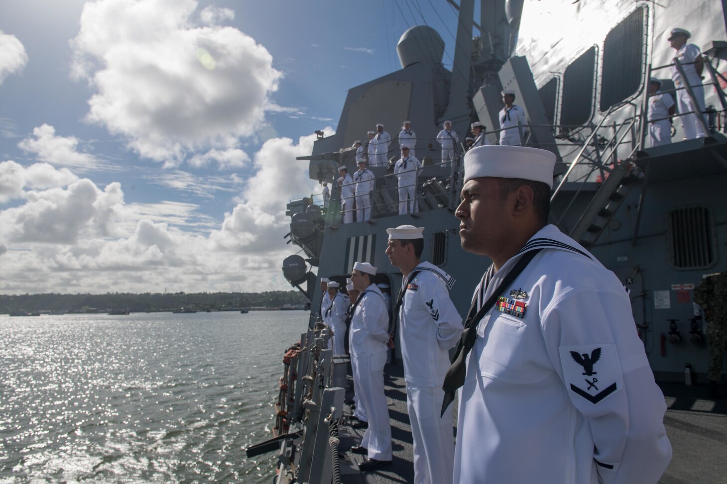 U.S. Navy Sailors assigned to the guided-missile destroyer USS Stockdale (DDG 106), man the rails as the Stockdale pulls into Suva, Fiji, for a port visit, April 30, 2019. The Stockdale is deployed to the U.S. 7th Fleet are of operations in support of security and stability in the Indo-Pacific region.