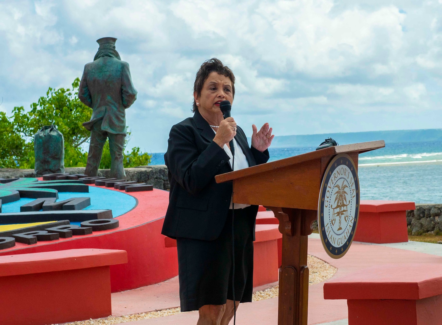 HAGÅTÑA, Guam (April 30, 2019) – Governor of Guam Lou Leon Guerrero delivers remarks during an unveiling of the official plaques for the Lone Sailor statue at the Ricardo J. Bordallo Governor's Complex in Hagåtña April 30.