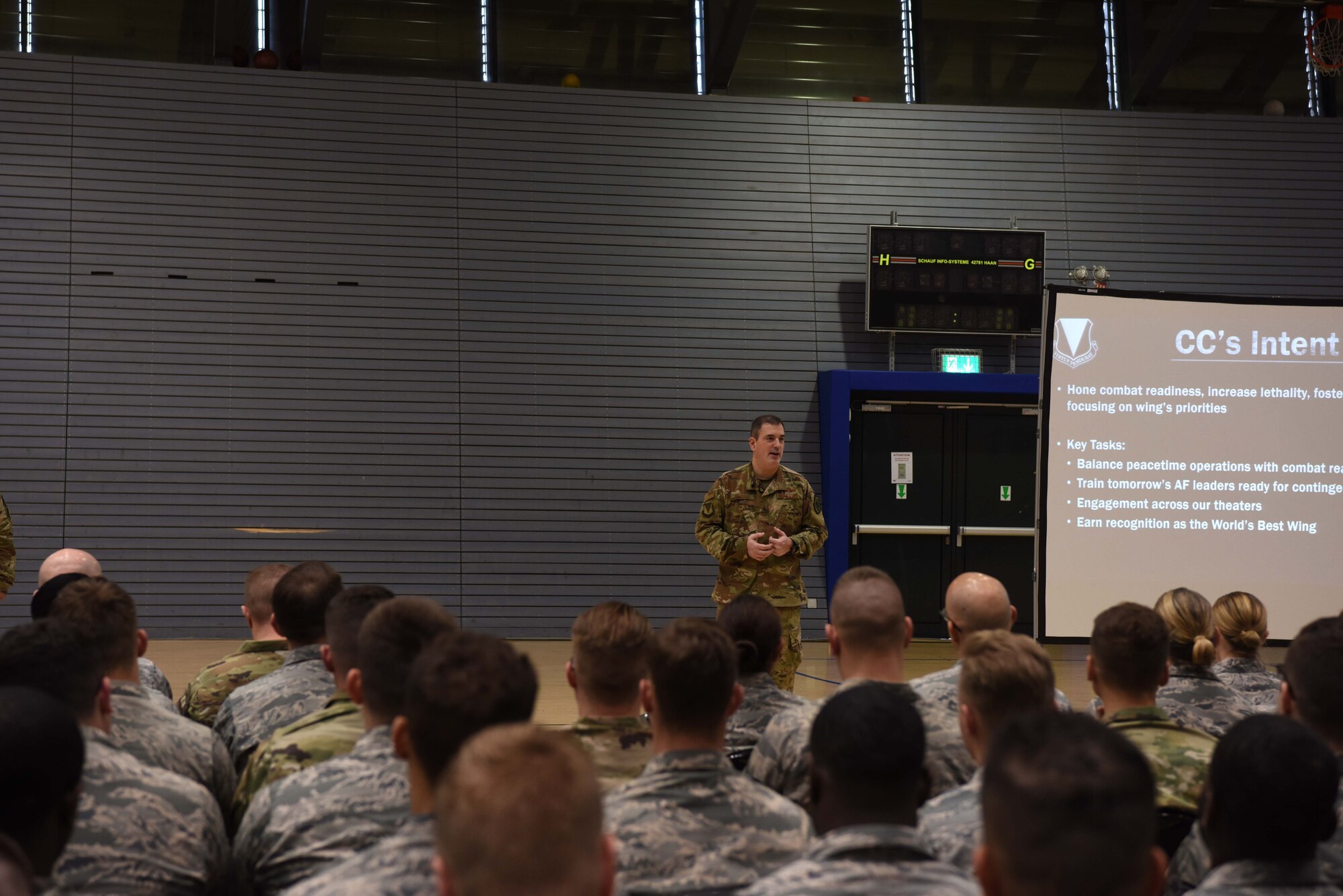 U.S. Air Force Brig. Gen. Mark R. August, 86th Airlift Wing commander, speaks to a group of Airmen at an all-call on Ramstein Air Base, Germany, April, 26, 2019.During the all-call August outlined his future goals for the wing.