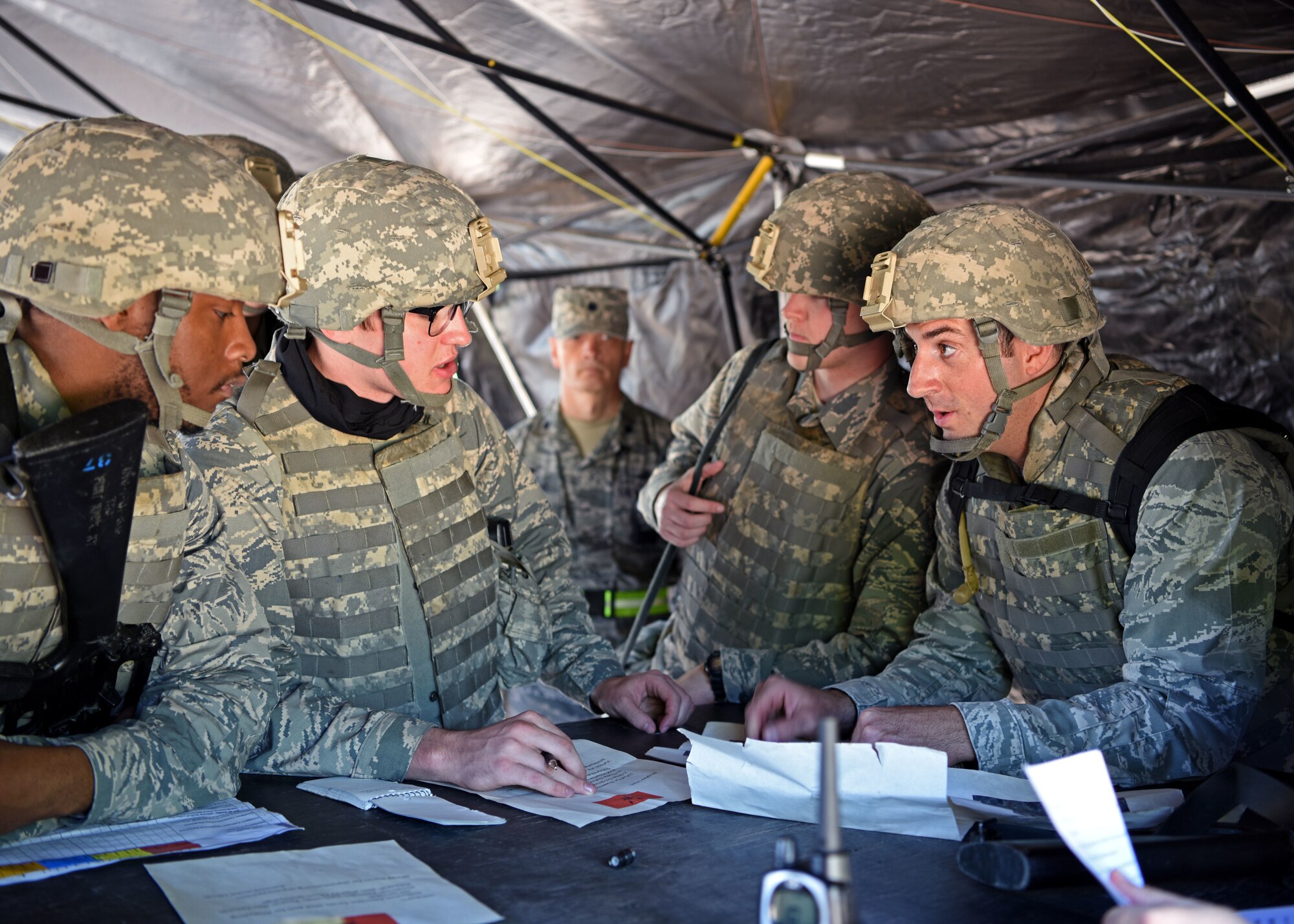 Angelo State University Air Force ROTC Cadets plan their next mission with the leaders of each fire team during their field training exercise at Goodfellow Air Force Base, Texas, April, 25, 2019. Cadets are taught many valuable lessons to prepare them for future leadership positions. (U.S. Air Force Airman 1st Class Ethan Sherwood/Released)