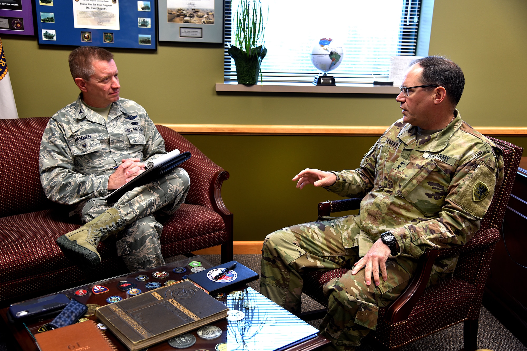 Michigan Air National Guard Col. Rolf E. Mammen discusses the future of the 127th Wing and Selfridge Air National Guard base with Maj. Gen. Paul Rogers, Adjutant General and Director of the Department of Military and Veterans Affairs on April 29, 2019, at Joint Force Headquarters in Lansing, Michigan.