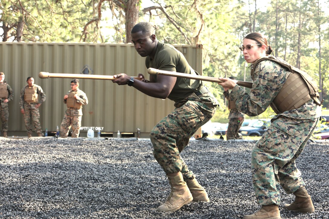 For three straight weeks, several Marines aboard Marine Corps Logistics Base Albany put their combat fighting skills to the test to secure the highest belt level in the U.S. Marine Corps Martial Arts Program. Out of 21 Marines who signed up for the gut-wrenching MCMAP training, 15 graduated with advanced belts, April 29. (U.S. Marine Corps photo by Re-Essa Buckels)