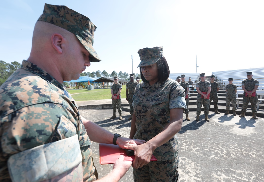 For three straight weeks, several Marines aboard Marine Corps Logistics Base Albany put their combat fighting skills to the test to secure the highest belt level in the U.S. Marine Corps Martial Arts Program. Out of 21 Marines who signed up for the gut-wrenching MCMAP training, 15 graduated with advanced belts, April 29. (U.S. Marine Corps photo by Re-Essa Buckels)