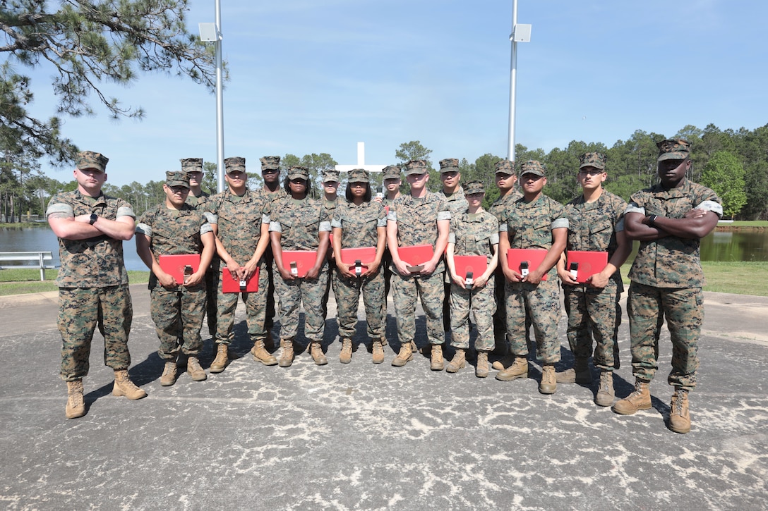 For three straight weeks, several Marines aboard Marine Corps Logistics Base Albany put their combat fighting skills to the test to secure the highest belt level in the U.S. Marine Corps Martial Arts Program. Out of 21 Marines who signed up for the gut-wrenching MCMAP training, 15 graduated with advanced belts, April 29. (U.S. Marine Corps photo by Re-Essa Buckels)