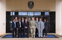 Lt. Gen. James H. Dickinson, commanding general, U.S. Army Space and Missile Defense Command/Army Forces Strategic Command, meets with delegates from the Republic of the Marshall Islands during the group’s visit to the command’s Redstone Arsenal, Alabama, headquarters April 5. (U.S. Army photo by Carrie David Campbell)