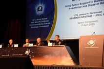 Lt. Gen. James H. Dickinson, commanding general, U.S. Army Space and Missile Defense Command/Army Forces Strategic Command, right, leads a panel during the 35th Space Symposium April 11 in Colorado Springs, Colorado. Leaders from throughout the command as well as West Point, joined Dickinson in a panel discussion focusing on how the Army’s space capabilities apply to every Army and  joint force mission set, including humanitarian assistance and disaster relief. (U.S. Army photo by Dottie K. White)