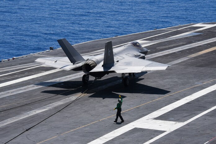 An F-35C Lightning II aircraft assigned to Strike Fighter Squadron (VFA) 147 makes an arrested landing during flight operations aboard the Nimitz-class aircraft carrier USS Abraham Lincoln (CVN 72). Abraham Lincoln is currently underway conducting carrier qualification.