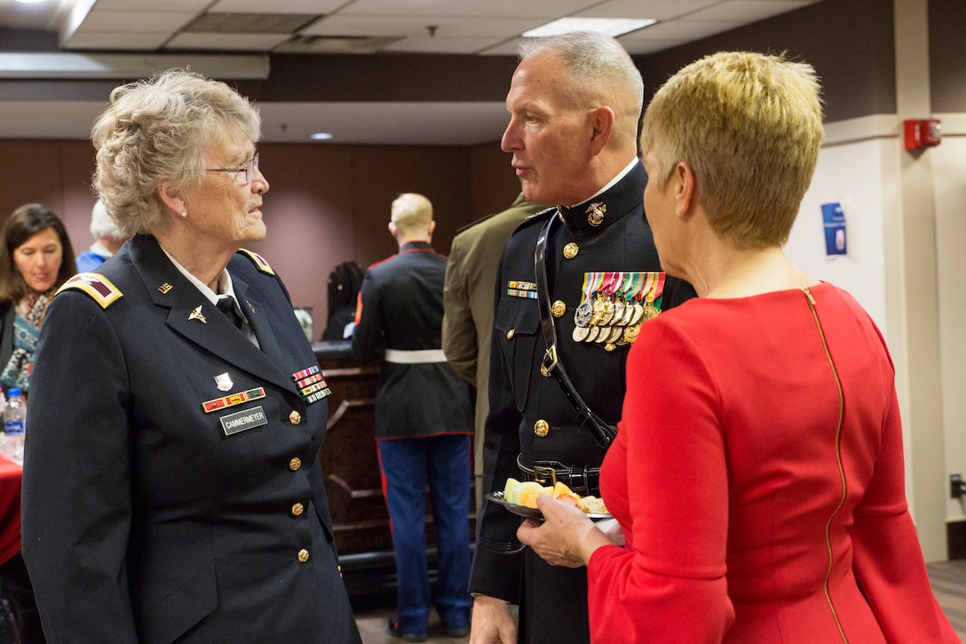 U.S. Marine Corps Forces Command Commanding General Lt. Gen. Mark Brilakis, center, talks to U.S. Army Ret. Col. Margarethe Cammermeyer, an honorary chair, prior to the 2019 Virginia International Tattoo at the Norfolk Scope in Norfolk, Virginia, April 26, 2019. Brilakis took part in the Honorary Salute alongside U.S. Air Force Lt. Gen. Christopher Weggeman, the deputy commander of Air Combat Command, Air Combat Command, and Swiss Army Major General Peter Wanner. This year’s festival was dedicated to women in the military. (U.S. Marine Corps photo by Cpl. Danielle Prentice/ Released)