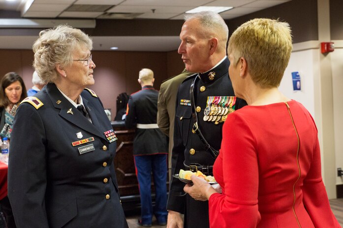 U.S. Marine Corps Forces Command Commanding General Lt. Gen. Mark Brilakis, center, talks to U.S. Army Ret. Col. Margarethe Cammermeyer, an honorary chair, prior to the 2019 Virginia International Tattoo at the Norfolk Scope in Norfolk, Virginia, April 26, 2019.