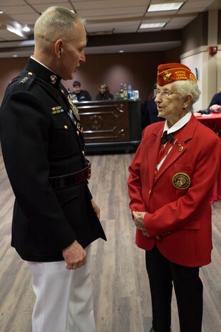 U.S. Marine Corps Forces Command Commanding General Lt. Gen. Mark Brilakis, left, talks to U.S. Marine Corps Reserves Sgt. Miriam Guilfoyl Triscritti, an honorary chair, prior to the 2019 Virginia International Tattoo at the Norfolk Scope in Norfolk, Virginia, April 26, 2019.