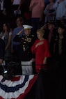 U.S. Marine Corps Forces Command Commanding General Lt. Gen. Mark Brilakis salutes during the National Anthem at the 2019 Virginia International Tattoo held in the Norfolk Scope in Norfolk, Virginia, April 26, 2019.