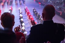 U.S. Marine Corps Forces Command Commanding General Lt. Gen. Mark Brilakis, right, applauds during the 2019 Virginia International Tattoo at the Norfolk Scope in Norfolk, Virginia, April 26, 2019.