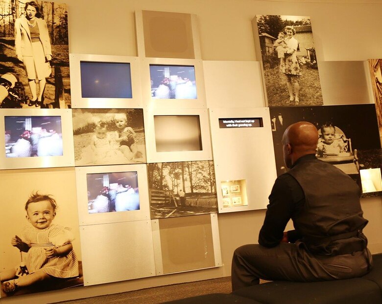 A Marine watches videos during a recent tour of the National Prisoner of War Museum in in Andersonville, Ga., recently.
