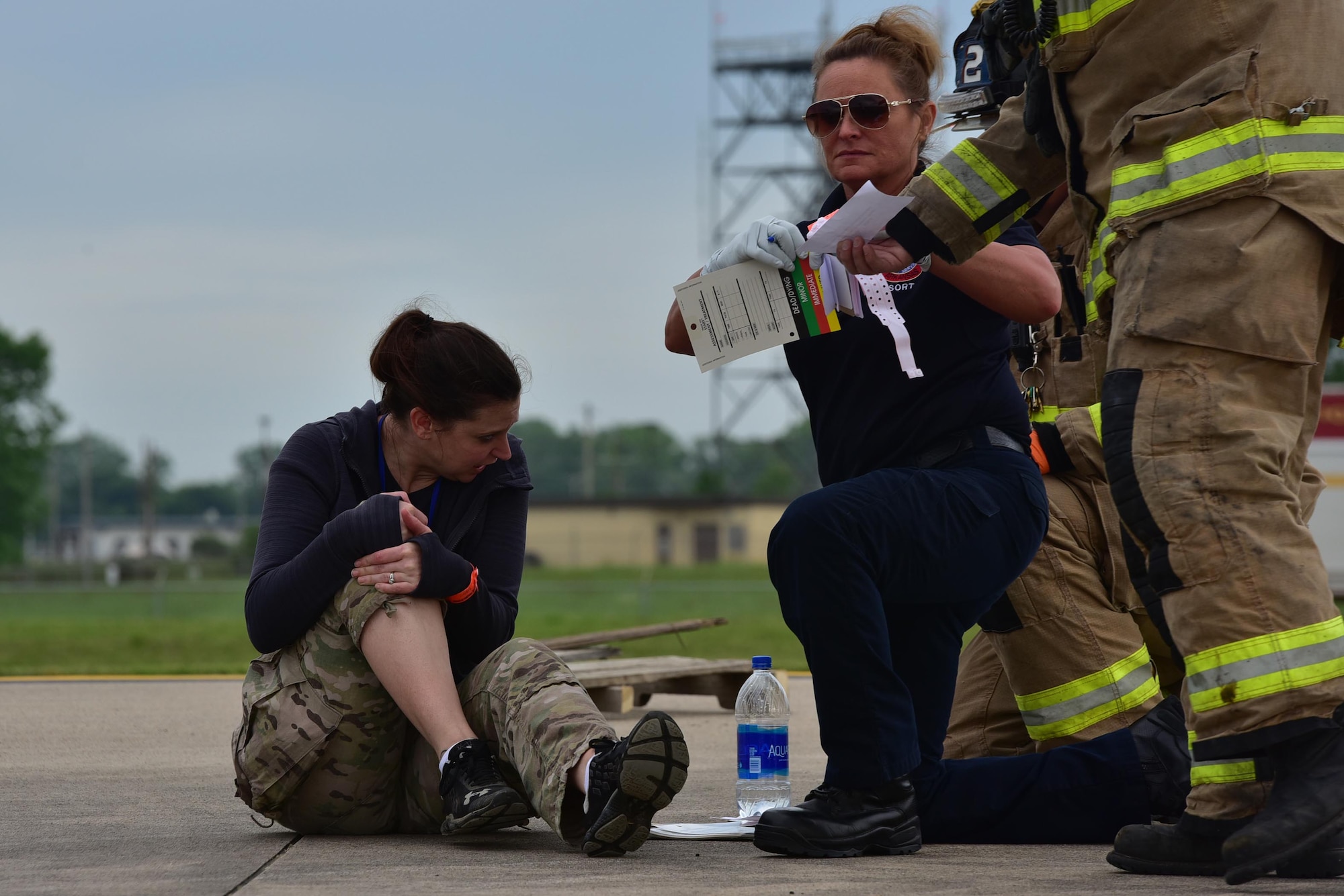 An Airman acts as a crash victim at a mass-casualty exercise.