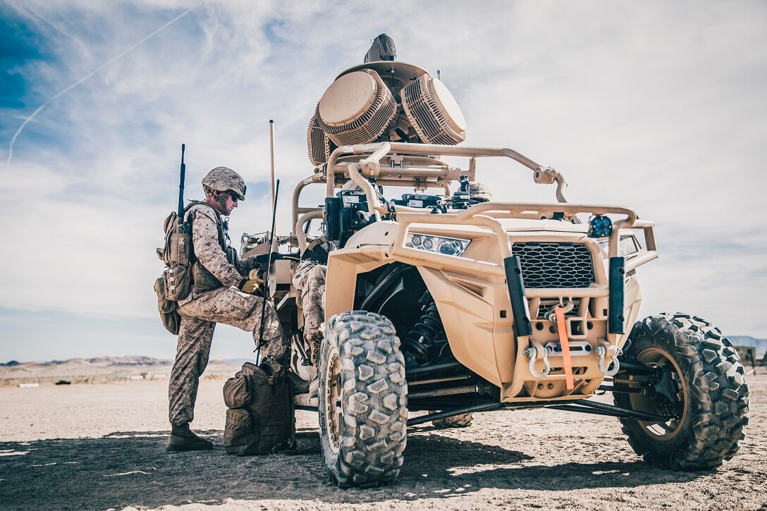 A Marine with 11th Marine Expeditionary Unit programs a counter-unmanned aircraft system on a Light Marine Air Defense Integrated System during a predeployment training exercise at Marine Corps Air Ground Combat Center, Twentynine Palms, California, Nov. 13, 2018. The LMADIS and other innovations will be on display during the 54th annual Sea-Air-Space Exposition, held May 6–8 at the Gaylord Convention Center in National Harbor, Maryland. (U.S. Marine Corps photo by Lance Cpl. Dalton S. Swanbeck)