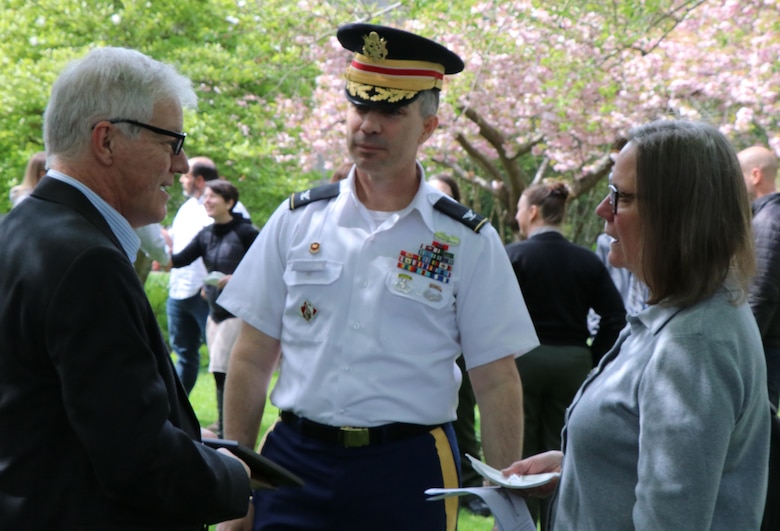 Discover Your Northwest Executive Director Jim Adams and board member Christy McDanold, talk with Seattle District Commander Col. Mark Geraldi at the locks.