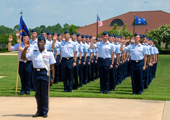 Officer Training School cadets in OTS class 16-07 take the oath of office during their graduation parade at Maxwell Air Force Base, Alabama on June 17, 2016. In April 2019, Maxwell AFB announced two beta courses, called Officer Training School-Accelerated Commissioning Program, that will shorten OTS from 40 training days to 14 training days for selected senior NCOs. (US Air Force photo by Melanie Rodgers Cox/Released)